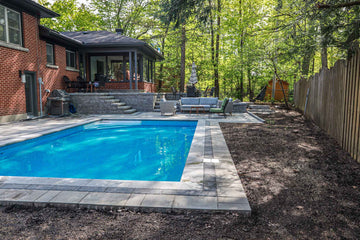 Inground Rectangle Pool 14x28 with Interlock pool surround and Terrazzo Caribbean Liner by Latham Pools