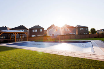 Rectangle pool construction with Outdoor pavillon , interlock and Coverstar automatic cover. 