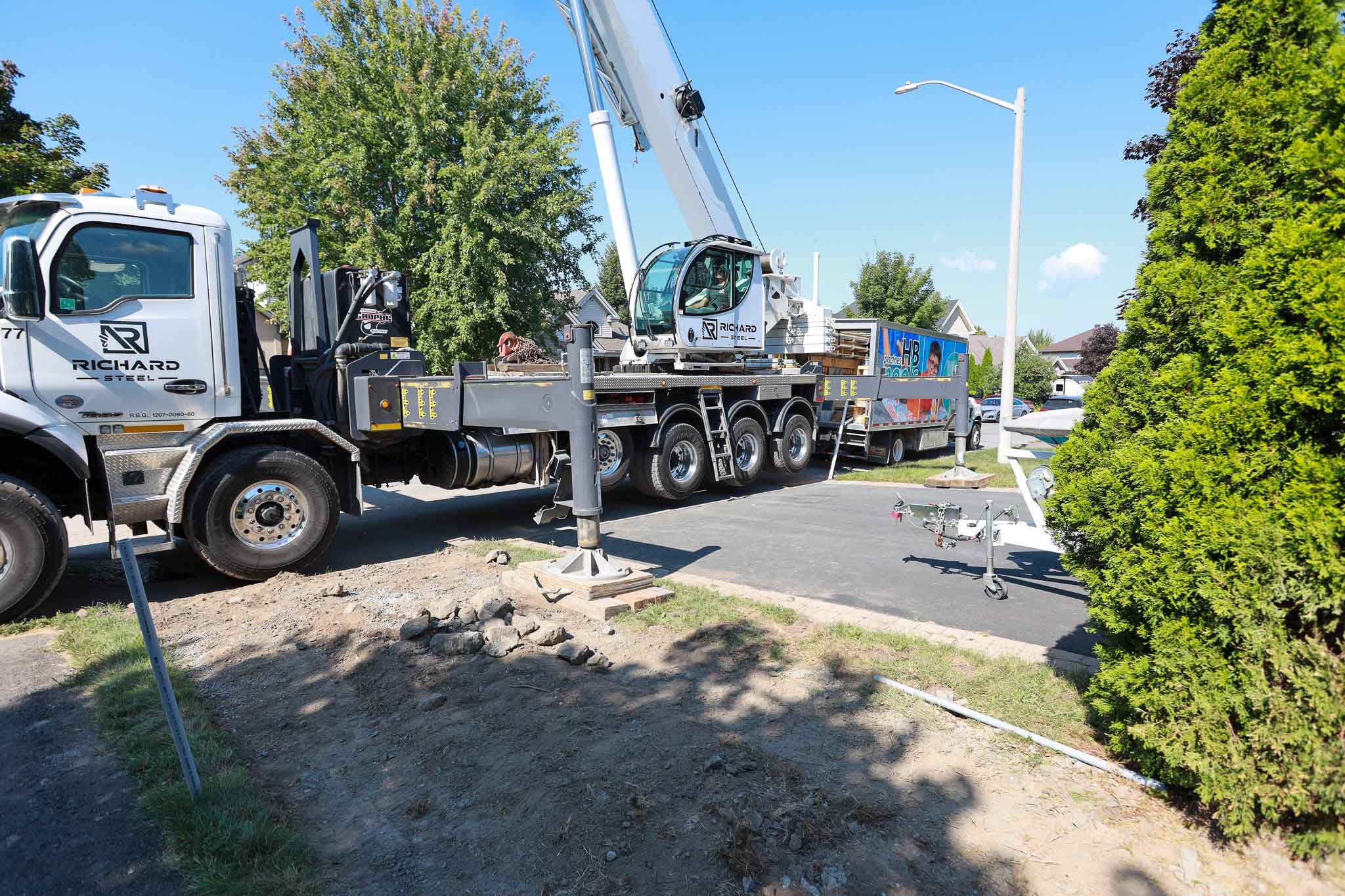 Commercial Crane Getting Ready to Move Fiberglass Pool in Clarence-Rockland