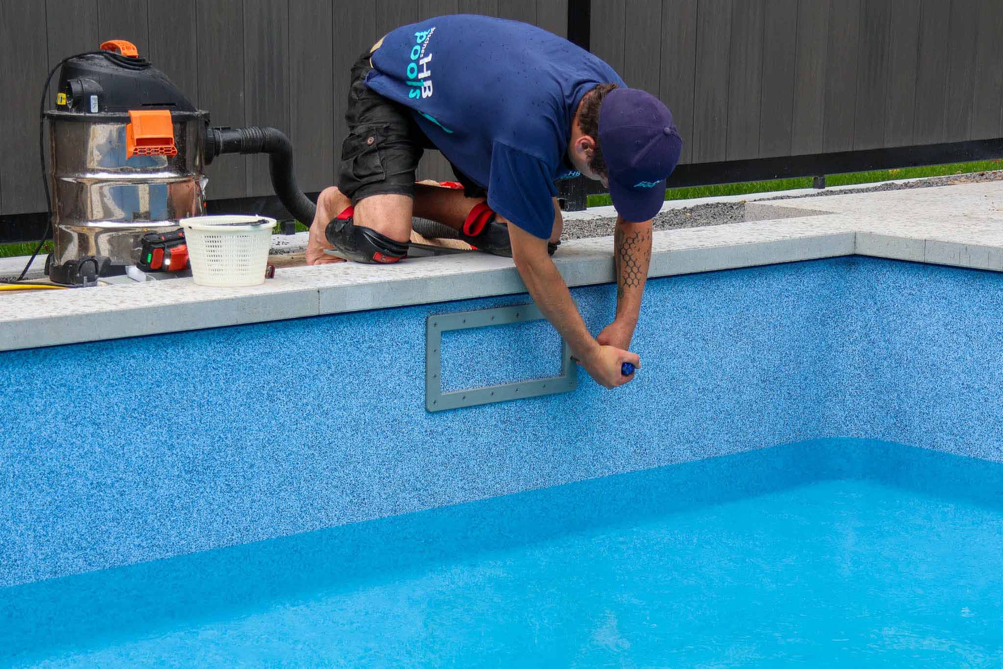 Swimming Pool Service Technician Installing Skimmer Flange on Liner Installation | HB Pools