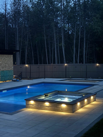 Inground Pool Sill Over Spa at Night in Nepean