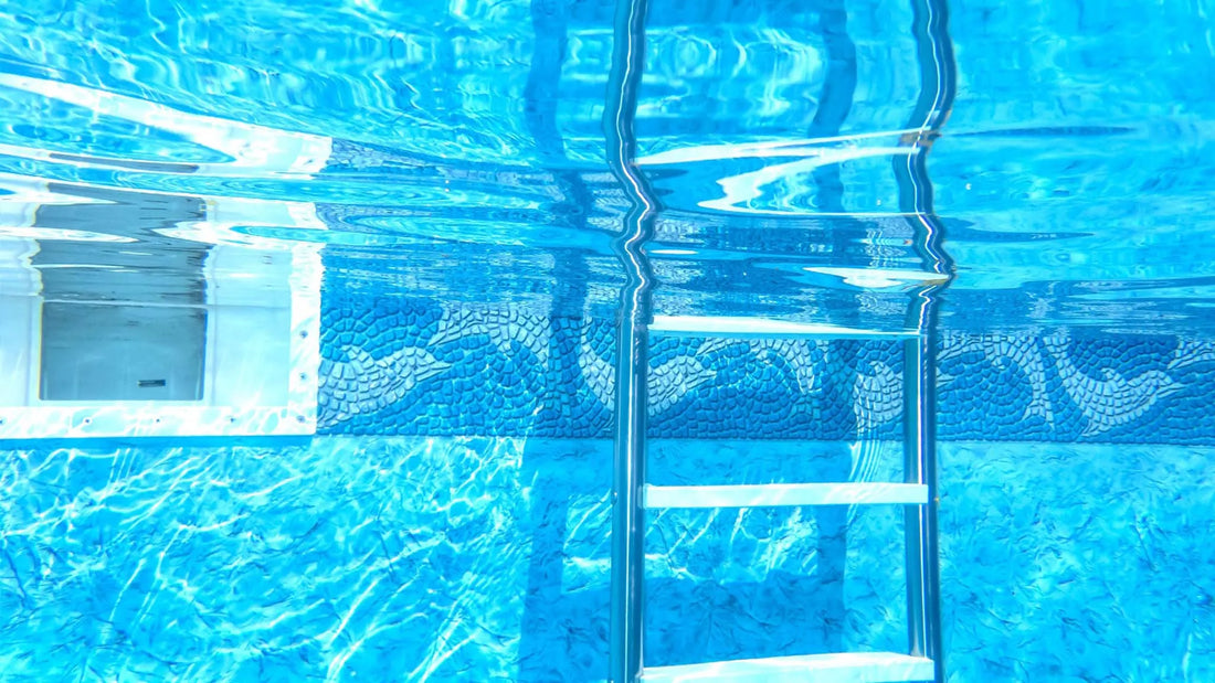 Professional leak detection services for swimming pools with underwater inspection near pool ladder and liner walls.