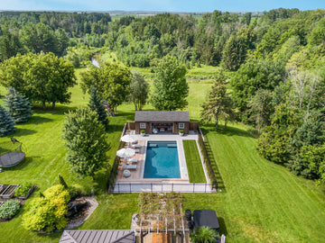 aerial view of inground pool and backyard layout in St-Isidore Ontario surrounded by trees